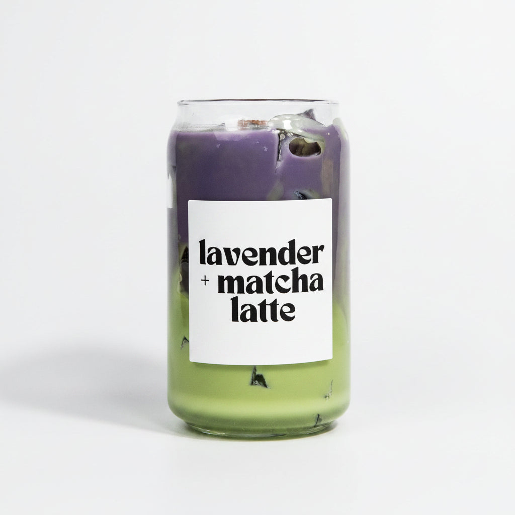 Candle with lavender and matcha latte scent on a white background