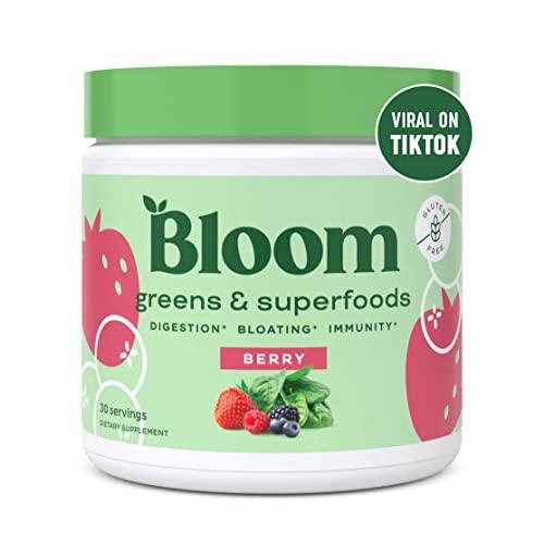 Bloom greens & superfoods container with berry flavor on a white background