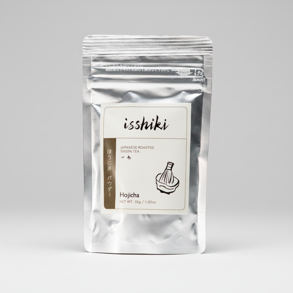 Silver package of isshiki Hojicha Japanese roasted green tea on a white background